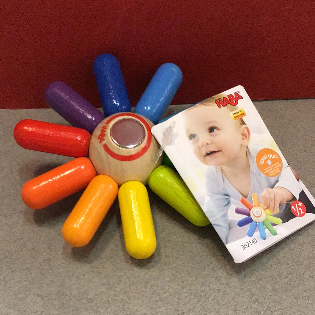 Rainbow Sun clutching toy